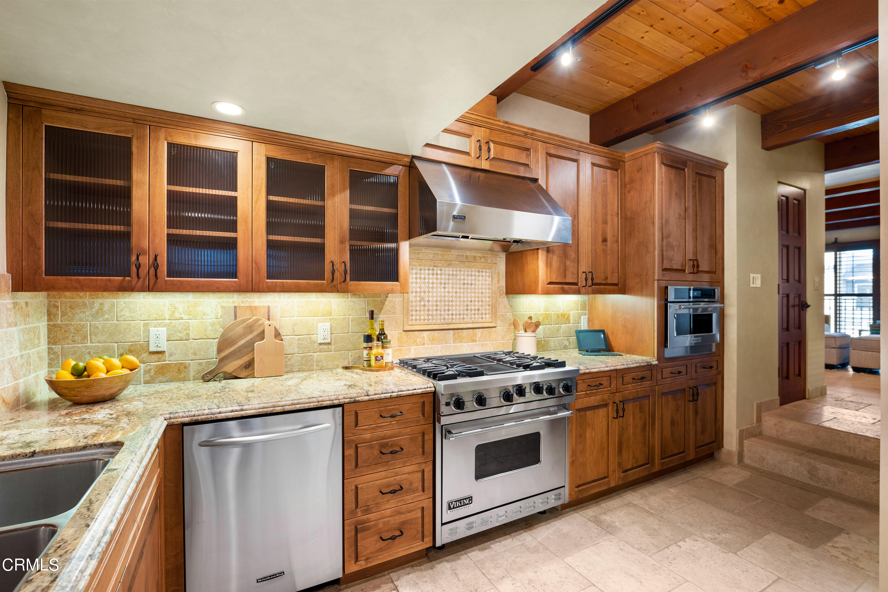 209 Ocean Drive Oxnard, CA 93035 - Photo 9 of 49 a kitchen that has a sink and a stove