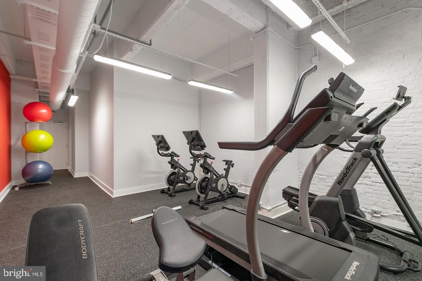 412 South 13th Street, Unit 212 Philadelphia, PA 19147 - Photo 10 of 16 a room with gym equipment