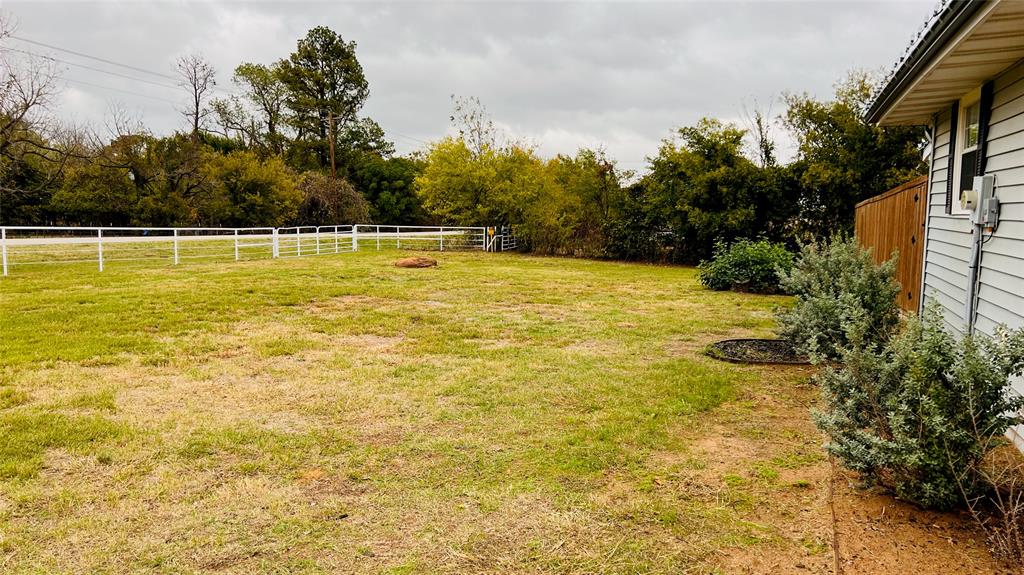 7301 Fishtrap Road Cross Roads, TX 76227 - Photo 11 of 40 a view of a swimming pool with an outdoor space and seating area