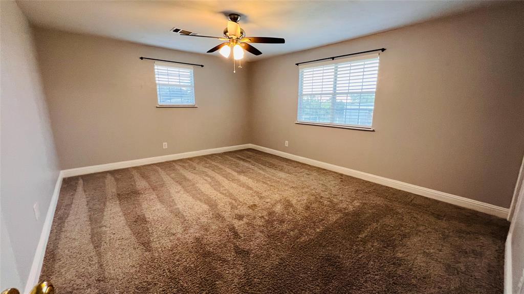 7301 Fishtrap Road Cross Roads, TX 76227 - Photo 19 of 40 a view of an empty room with a window