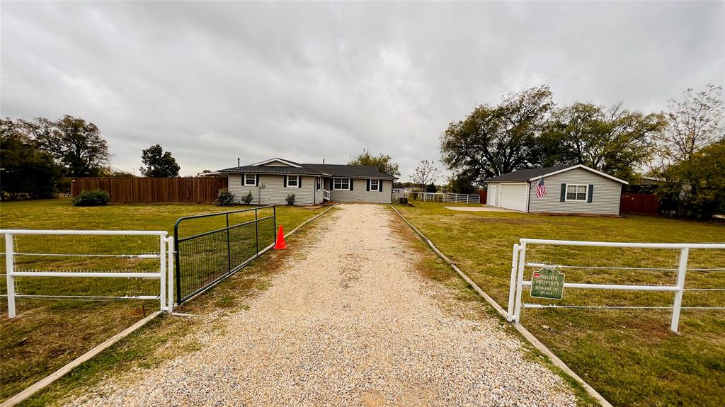 7301 Fishtrap Road Cross Roads, TX 76227 - Photo 2 of 40 a view of a house with a ocean view