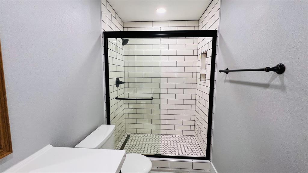7301 Fishtrap Road Cross Roads, TX 76227 - Photo 21 of 40 a bathroom with a shower