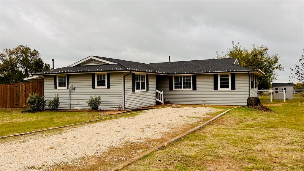 7301 Fishtrap Road Cross Roads, TX 76227 - Photo 3 of 40 a view of a house with a yard