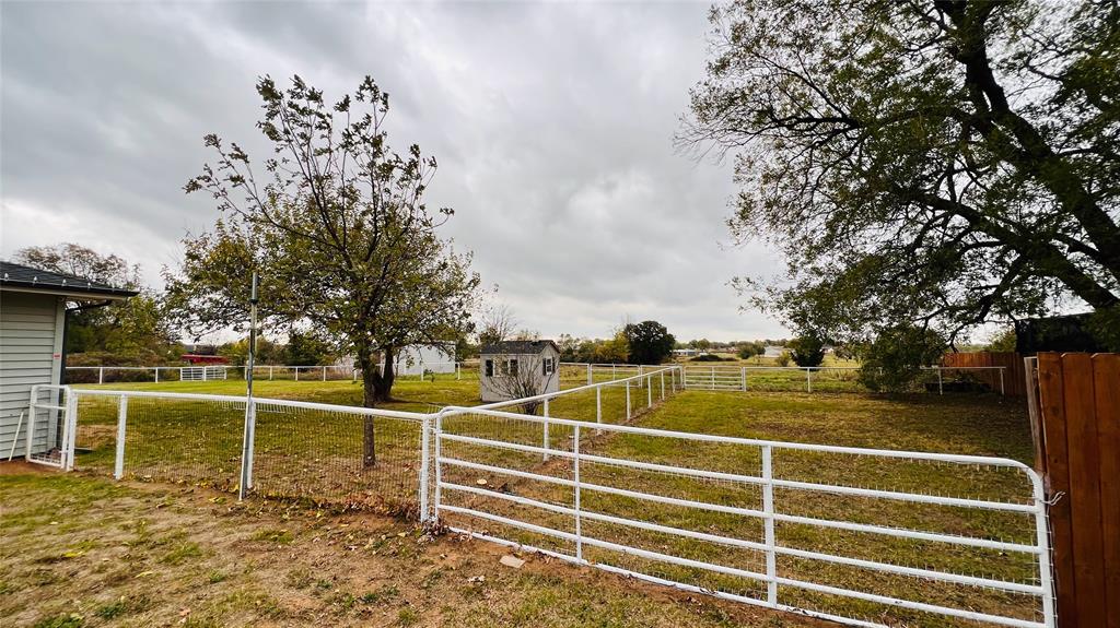 7301 Fishtrap Road Cross Roads, TX 76227 - Photo 31 of 40 a view of a yard with basketball court