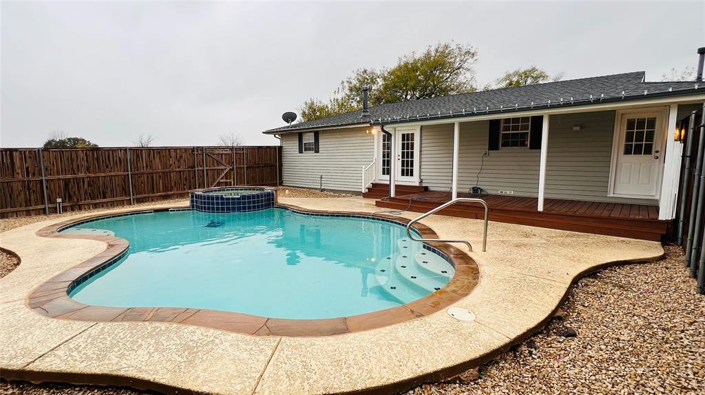7301 Fishtrap Road Cross Roads, TX 76227 - Photo 35 of 40 a view of a backyard with swimming pool