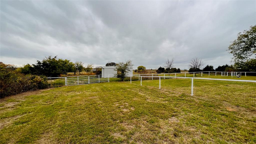 7301 Fishtrap Road Cross Roads, TX 76227 - Photo 9 of 40 a view of a swimming pool with an ocean