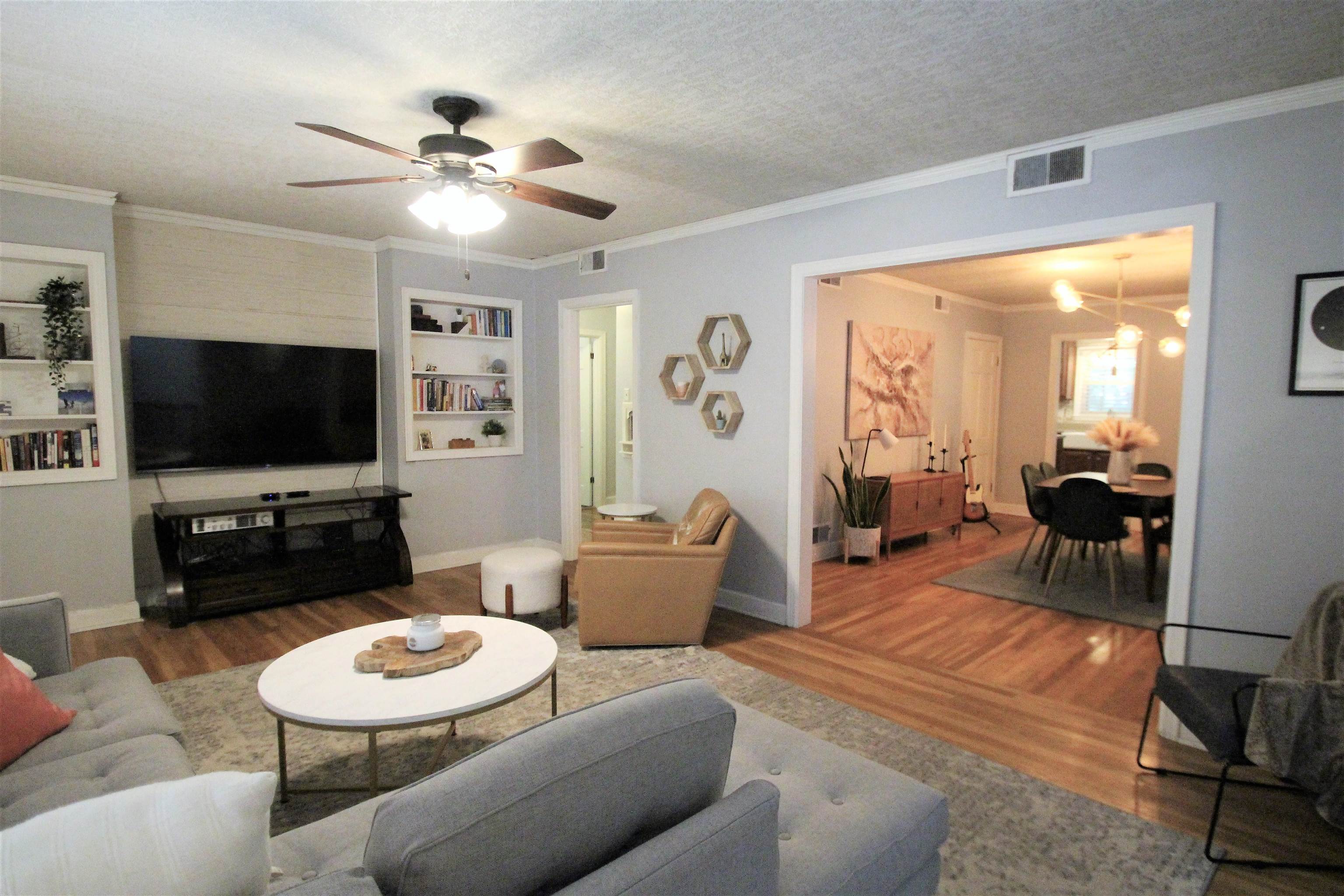 1156 Hayne Road Memphis, TN 38119 - Photo 11 of 25 a living room with furniture and a flat screen tv