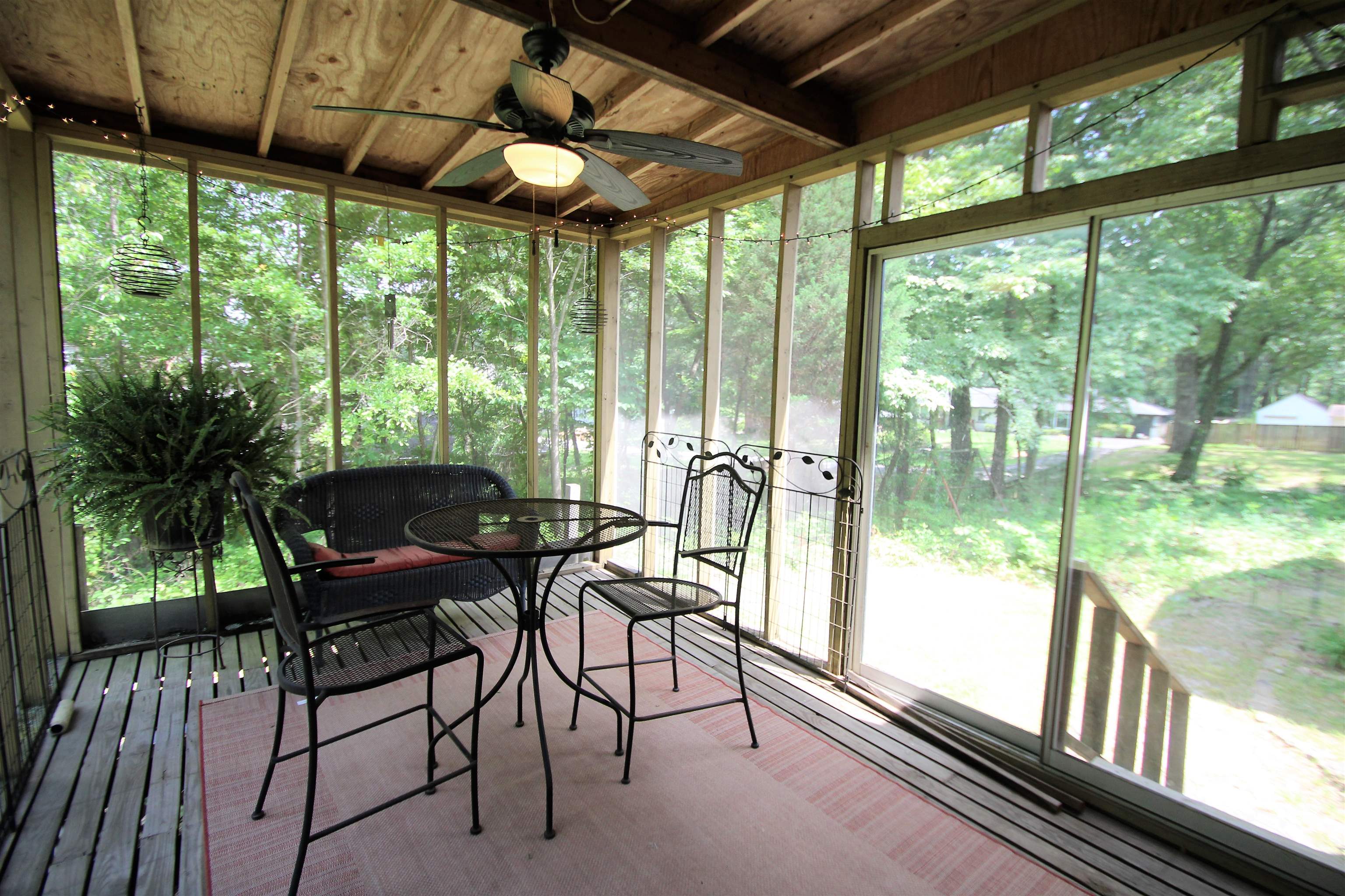 1156 Hayne Road Memphis, TN 38119 - Photo 10 of 25 a view of a porch with furniture and a yard