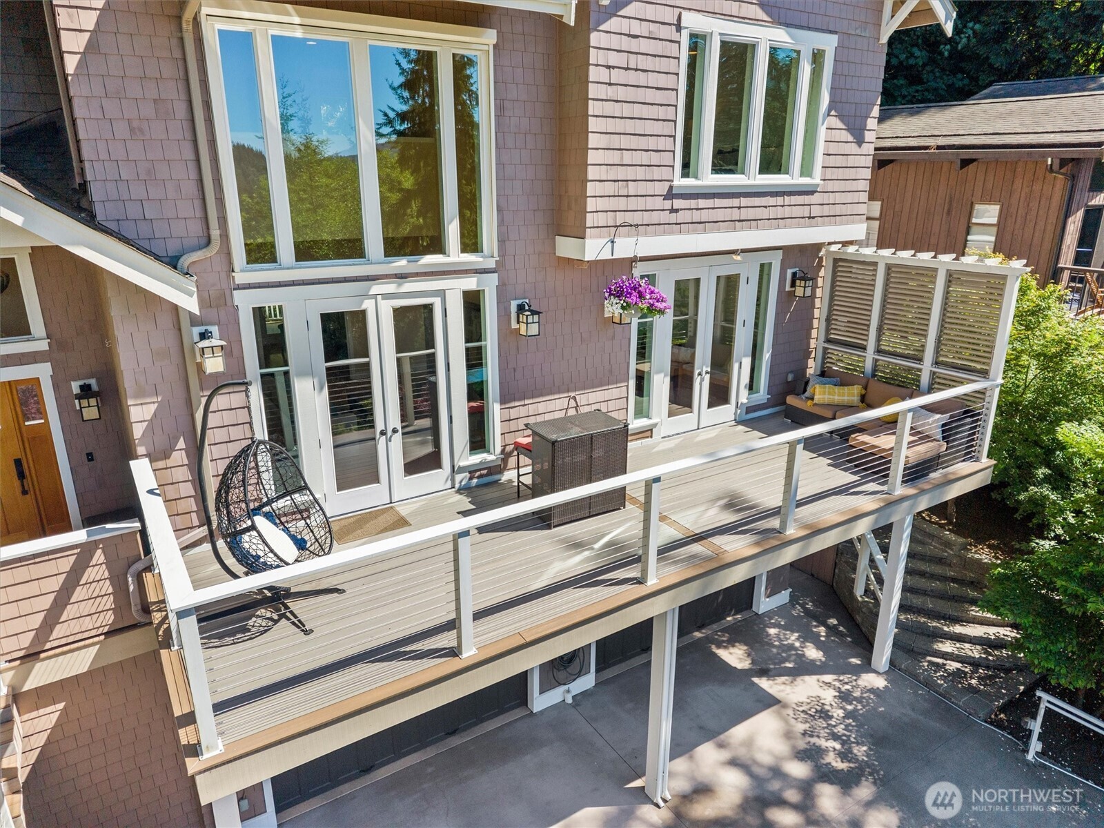 89 Grand View Lane Bellingham, WA 98229 - Photo 31 of 40 a view of a balcony with chairs and wooden floor