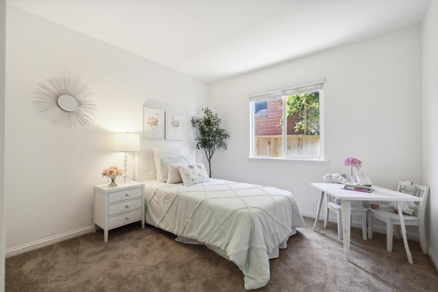 3230 Longview Drive San Bruno, CA 94066 - Photo 13 of 23 a bedroom with a bed table chair and a window
