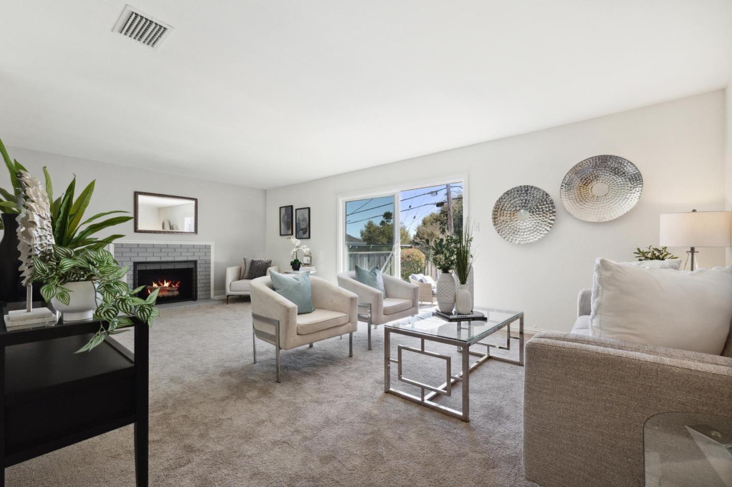 3230 Longview Drive San Bruno, CA 94066 - Photo 3 of 23 a living room with furniture a fireplace and a large mirror