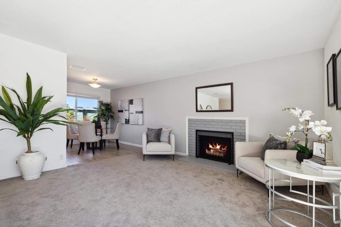 3230 Longview Drive San Bruno, CA 94066 - Photo 5 of 23 a living room with furniture and a fireplace