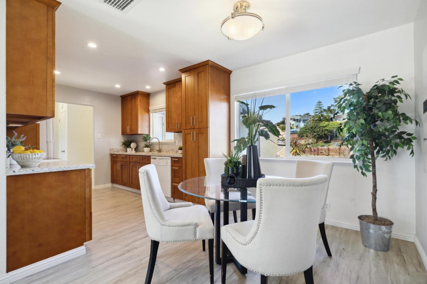 3230 Longview Drive San Bruno, CA 94066 - Photo 6 of 23 a view of a dining room with furniture and wooden floor