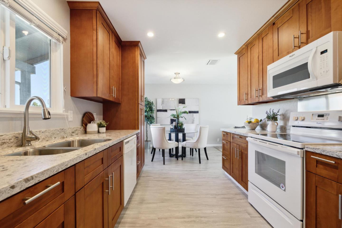 3230 Longview Drive San Bruno, CA 94066 - Photo 7 of 23 a kitchen with lots of counter top space and stainless steel appliances
