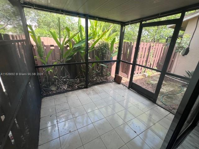 2622 North Nob Hill Road, Unit 2622 Sunrise, FL 33322 - Photo 14 of 16 a view of outdoor space with wooden floor and windows