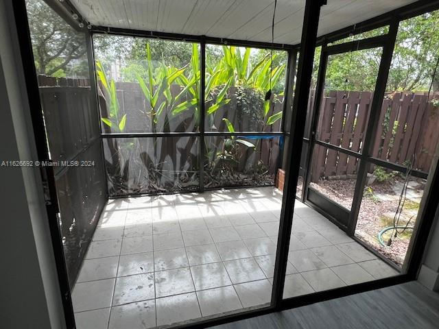 2622 North Nob Hill Road, Unit 2622 Sunrise, FL 33322 - Photo 15 of 16 a view of a glass door with a glass door