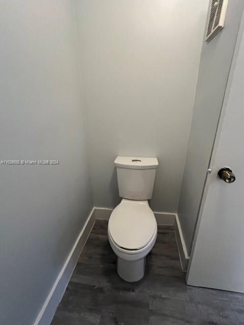 2622 North Nob Hill Road, Unit 2622 Sunrise, FL 33322 - Photo 8 of 16 a bathroom with a toilet