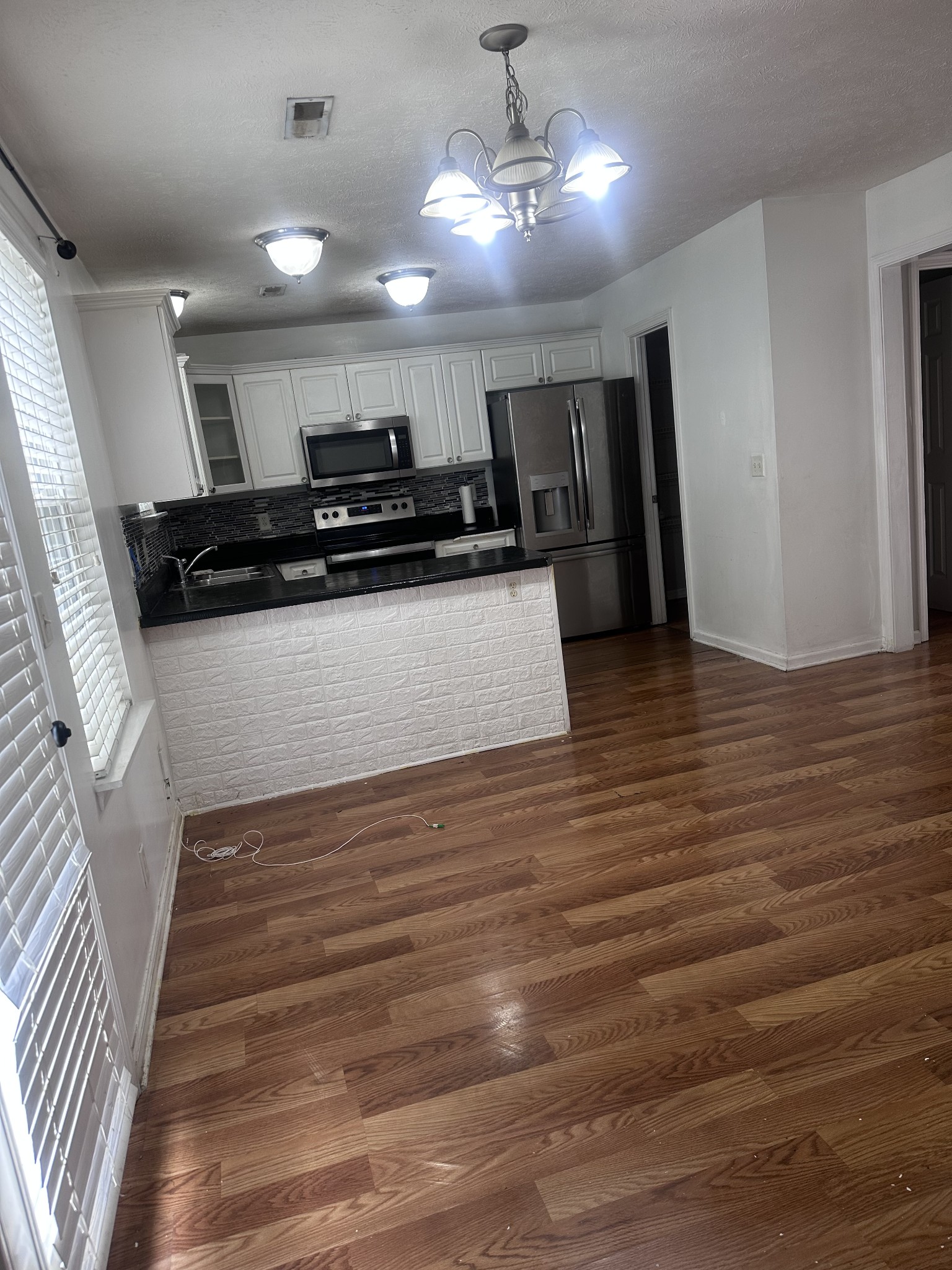 3001 Hamilton Church Road, Unit 403 Antioch, TN 37013 - Photo 12 of 21 a view of a hallway with wooden floor