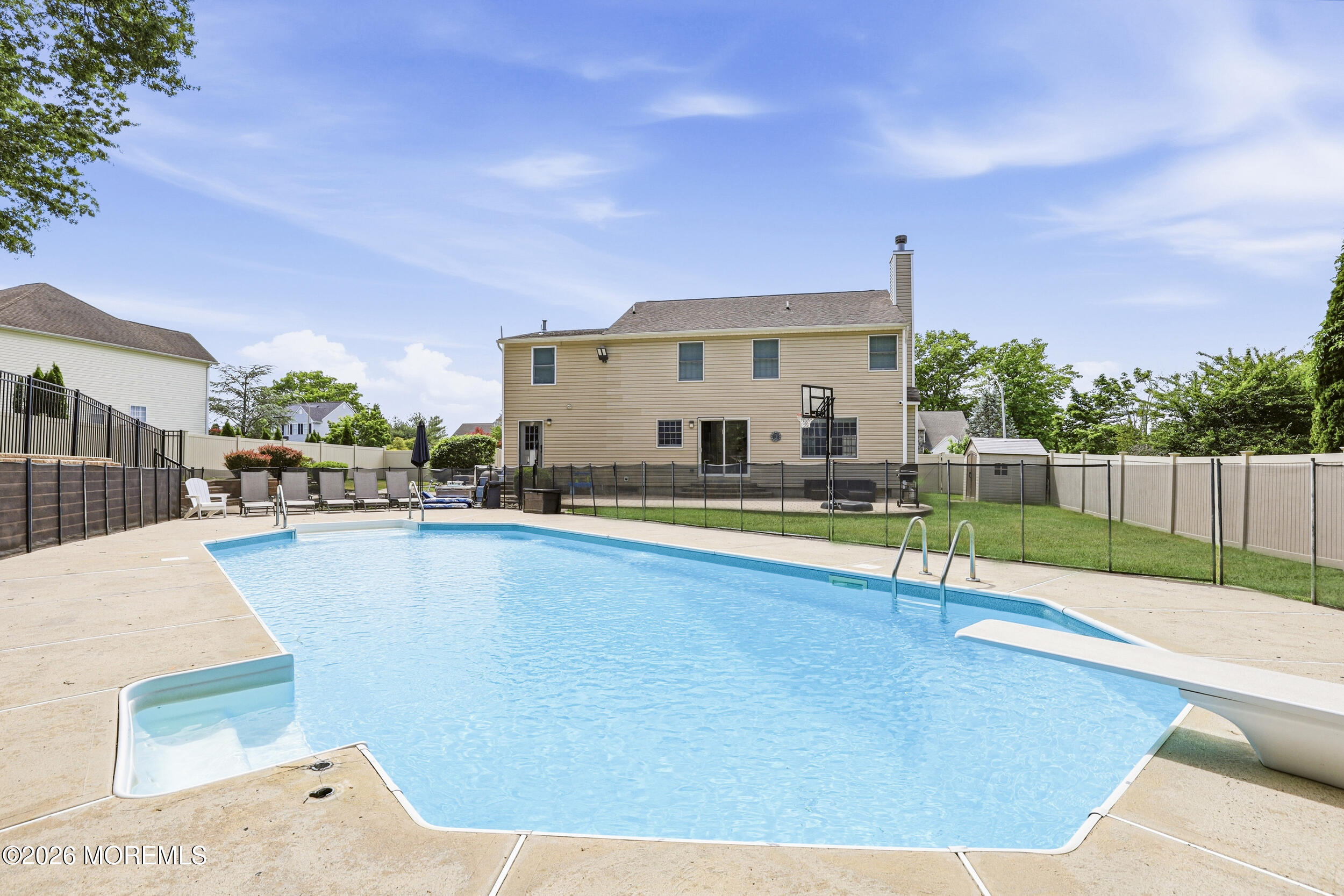 2055 MacKenzie Road Toms River, NJ 08755 - Photo 40 of 56 a view of a house with swimming pool