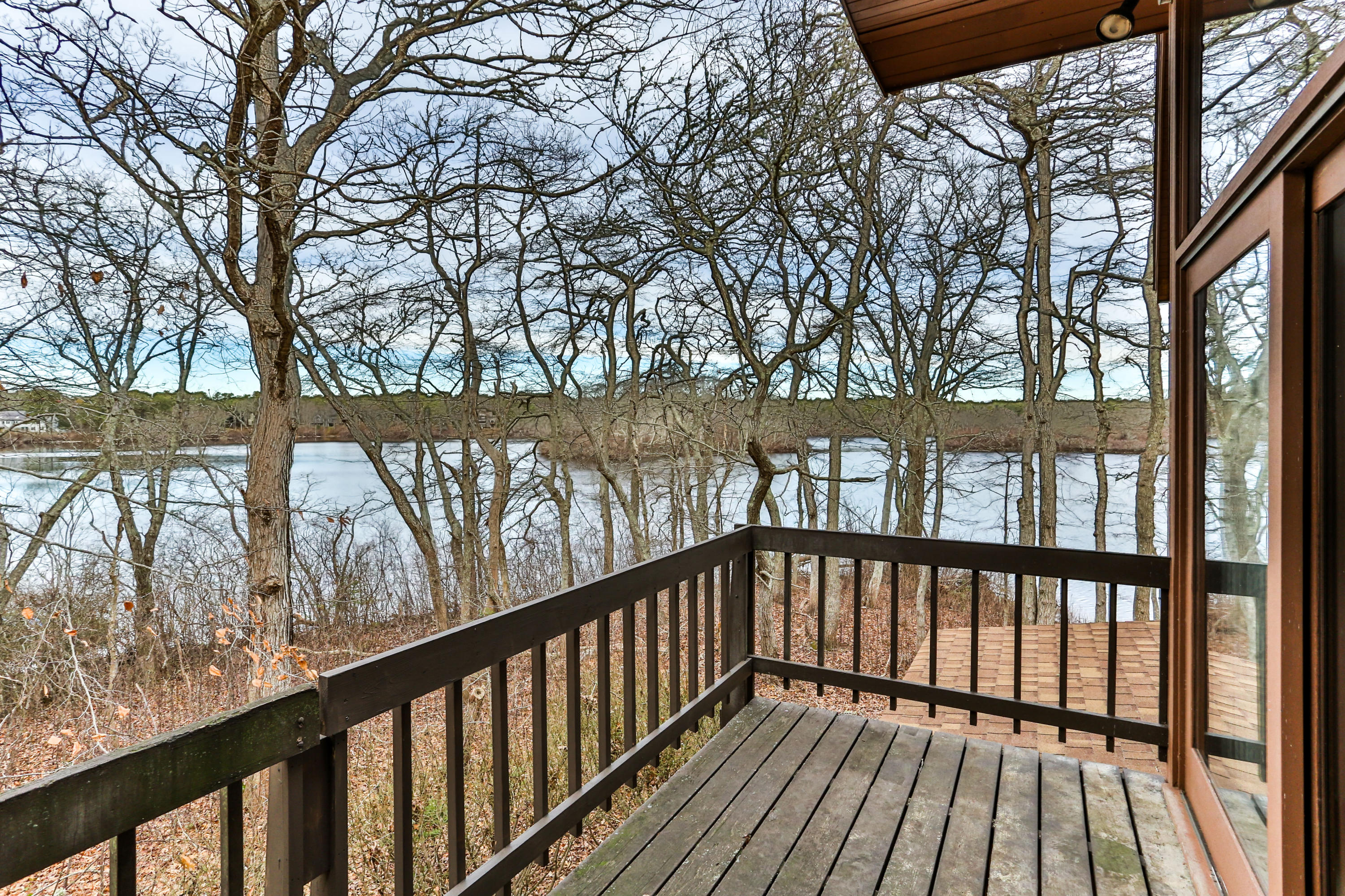 278 Huckins Neck Road Centerville, MA 02601 - Photo 13 of 52 a view of wooden balcony
