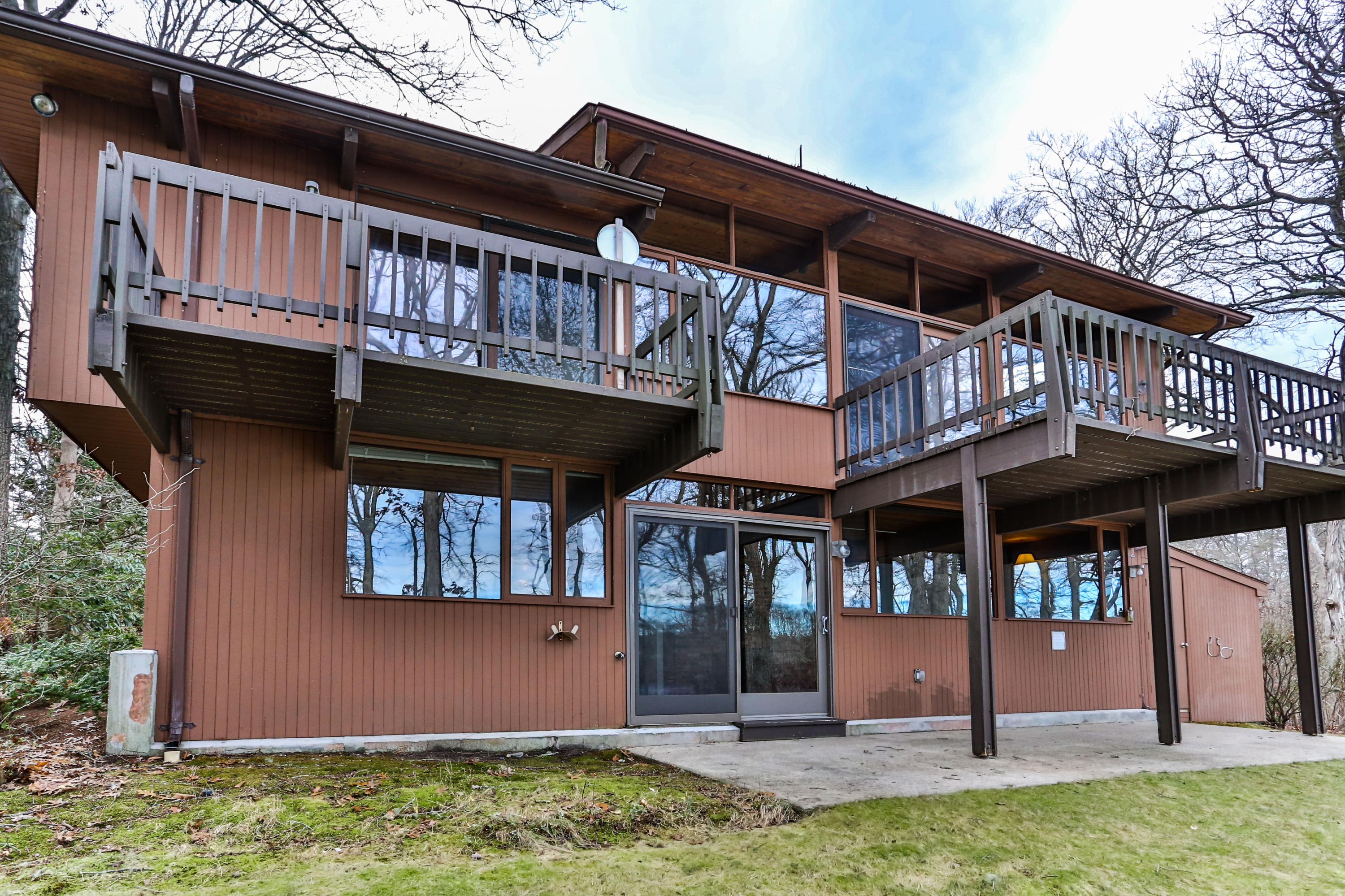 278 Huckins Neck Road Centerville, MA 02601 - Photo 2 of 52 a front view of a house with porch