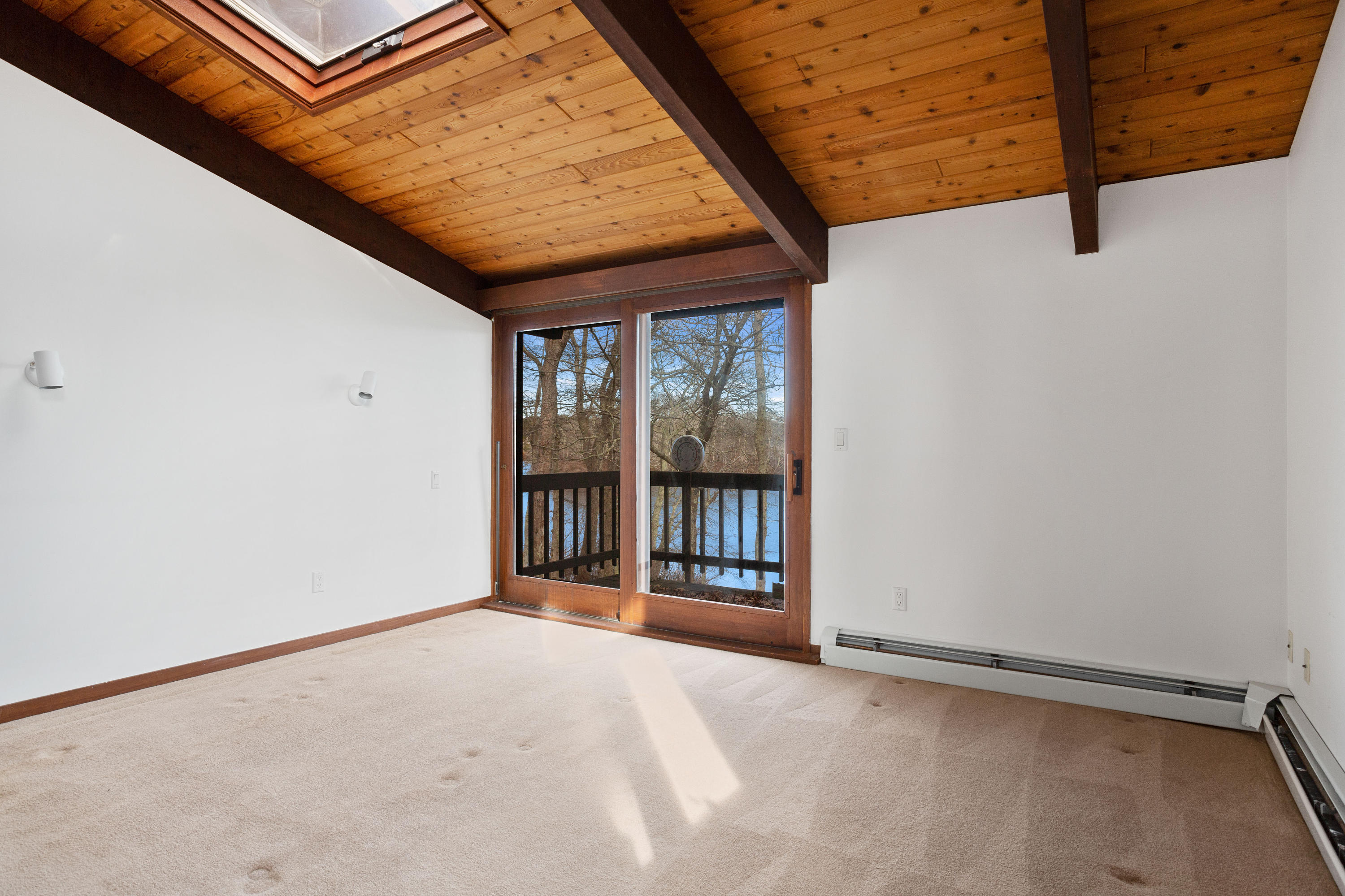 278 Huckins Neck Road Centerville, MA 02601 - Photo 28 of 52 a view of an empty room with a window