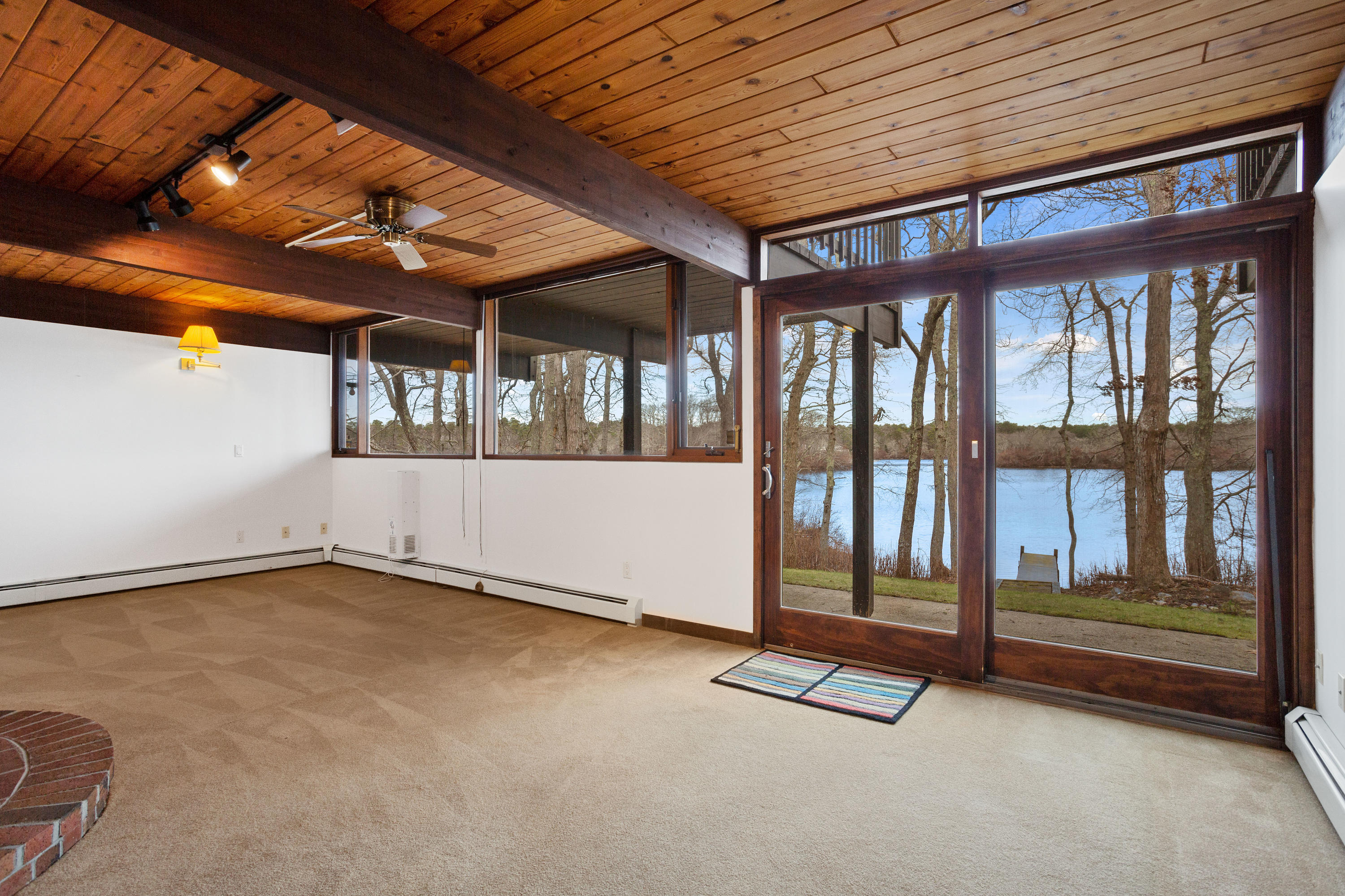 278 Huckins Neck Road Centerville, MA 02601 - Photo 35 of 52 an empty room with windows