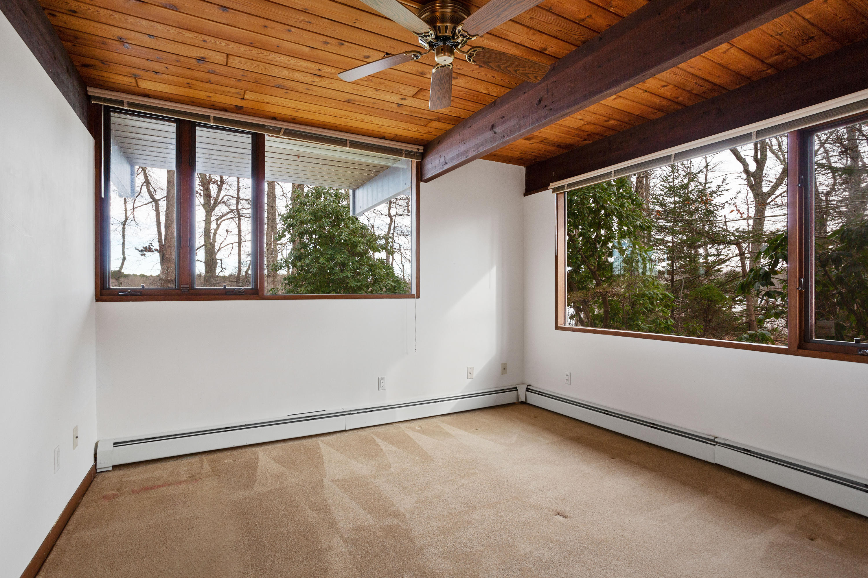 278 Huckins Neck Road Centerville, MA 02601 - Photo 39 of 52 an empty room with a window