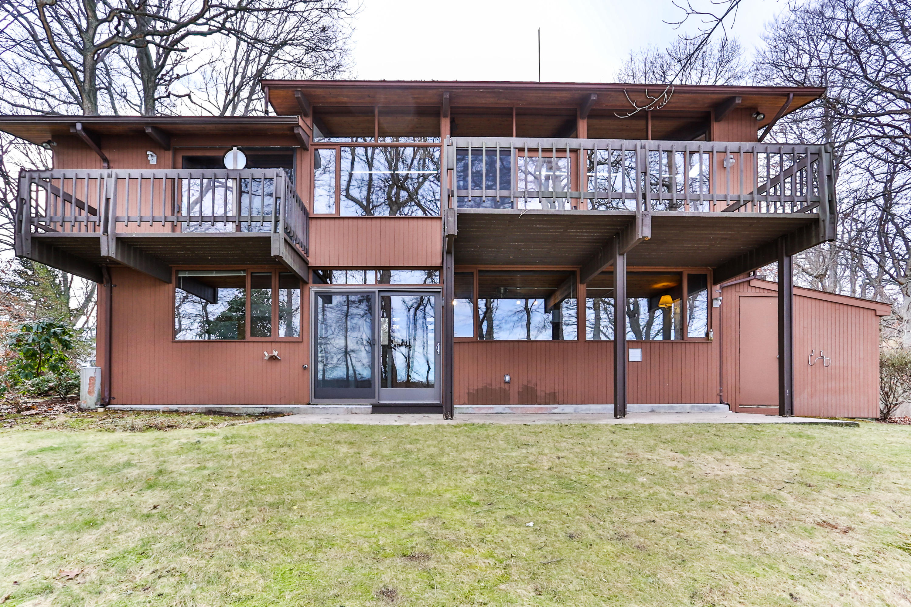 278 Huckins Neck Road Centerville, MA 02601 - Photo 49 of 52 a front view of a house with a yard