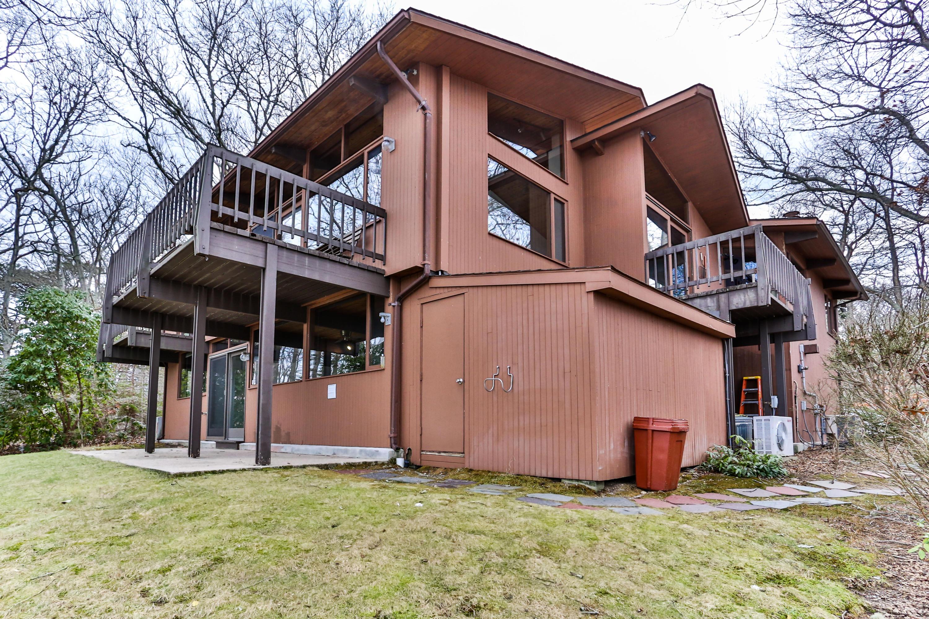 278 Huckins Neck Road Centerville, MA 02601 - Photo 50 of 52 a view of a house with a yard