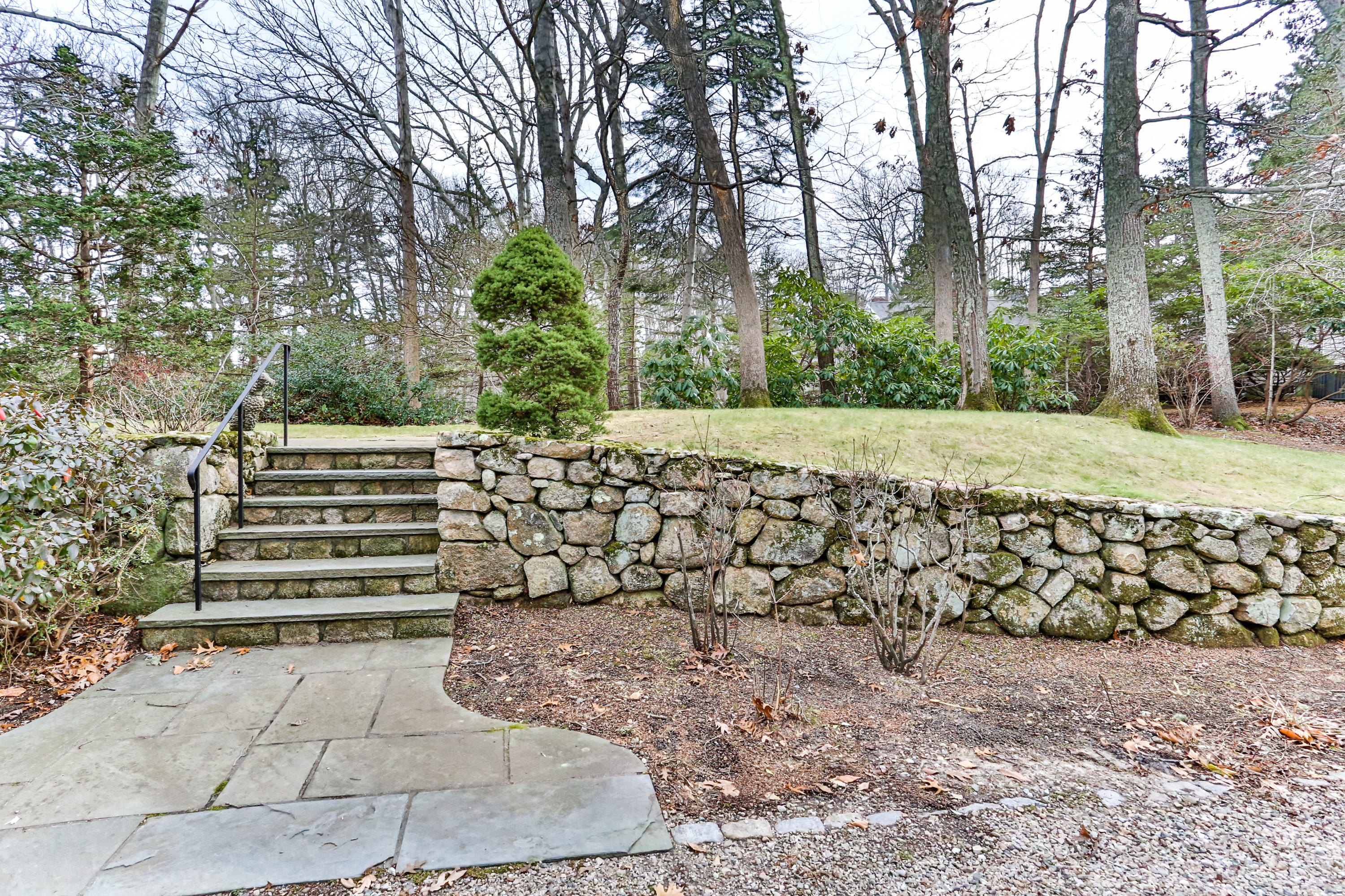 278 Huckins Neck Road Centerville, MA 02601 - Photo 7 of 52 a view of a yard with plants and trees