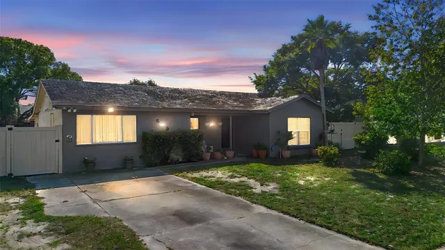 a view of a porch with a yard