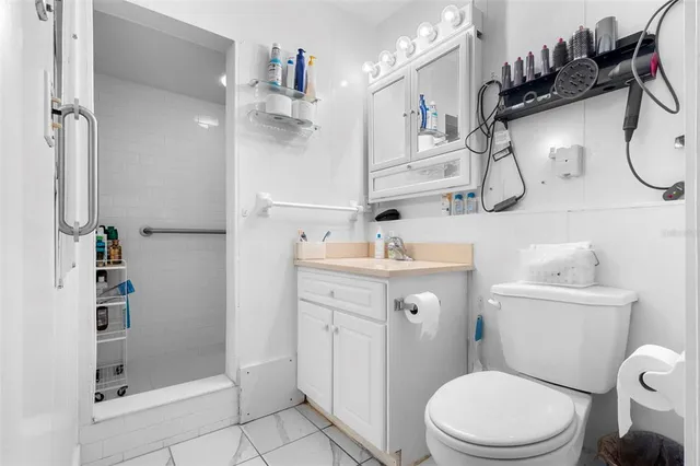 a view of backyard of house with green space