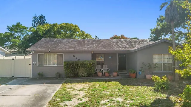 a kitchen with a refrigerator stove and sink