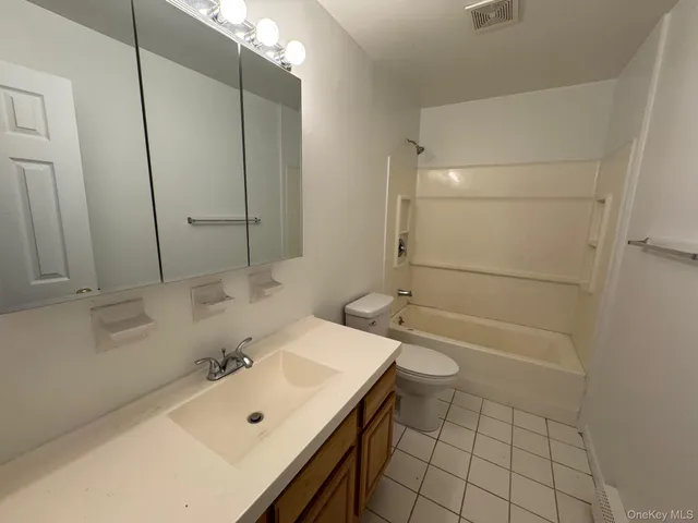 a view of a house with a garage