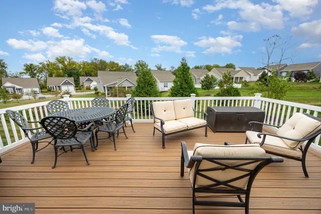 a view of a terrace with furniture