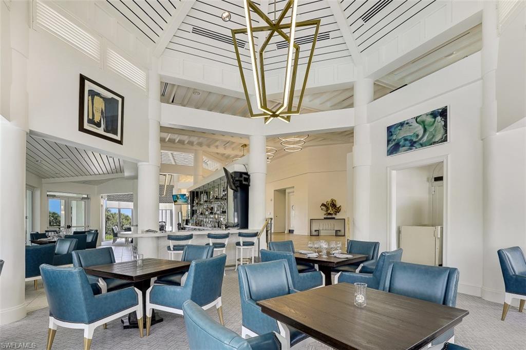 8121 Via Vecchia Naples, FL 34108 - Photo 33 of 35 a view of a dining room with furniture