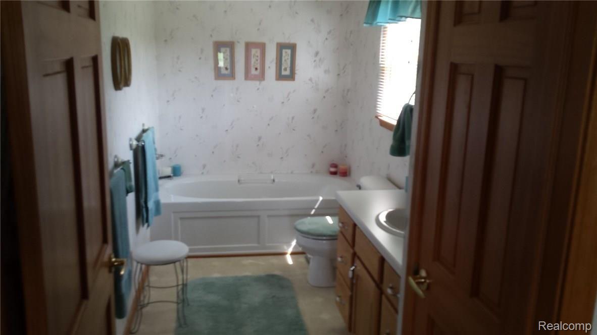 13266 Bryce Road Emmett, MI 48022 - Photo 11 of 20 This is a view of the master bath.
