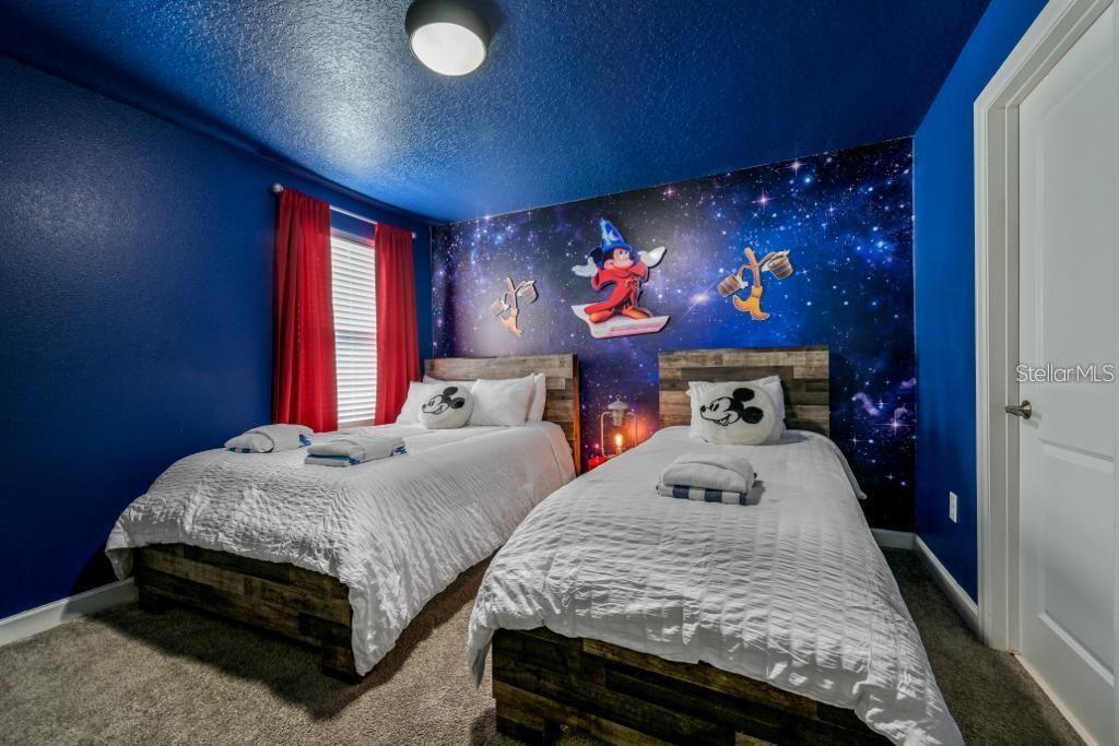 4532 Target Boulevard Kissimmee, FL 34746 - Photo 17 of 52 a bedroom with bed and window