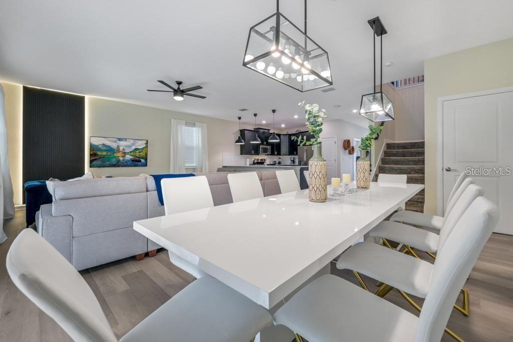 4532 Target Boulevard Kissimmee, FL 34746 - Photo 26 of 52 a view of a dining room with furniture and chandelier