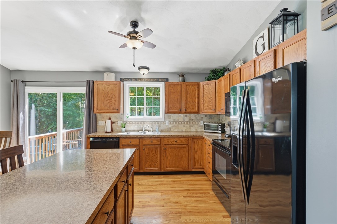 3 Cote Court Coventry, RI 02816 - Photo 10 of 34 Gleaming wood floors
Slider to deck