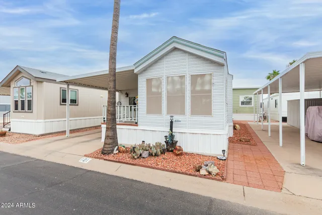 a front view of a house with a garage