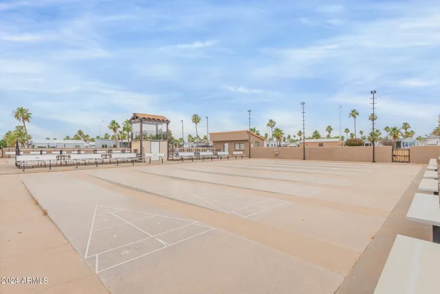 a view of a swimming pool with a terrace