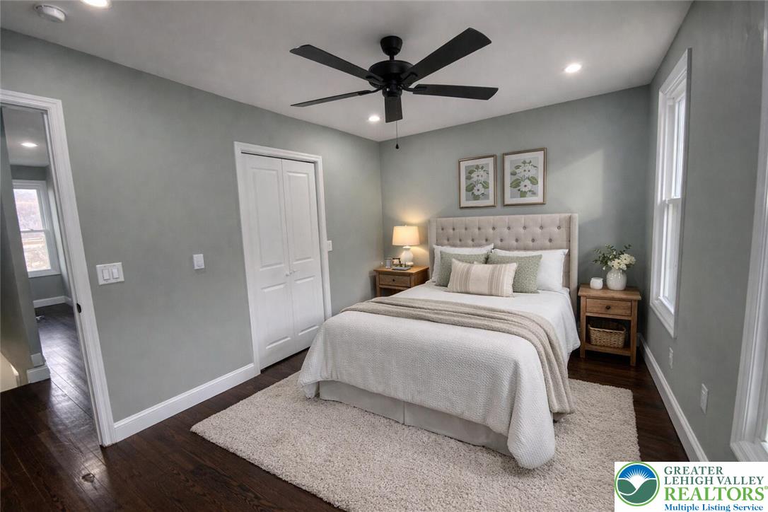 253 East Abbott Street Lansford, PA 18232 - Photo 13 of 43 a bedroom with a bed and a ceiling fan