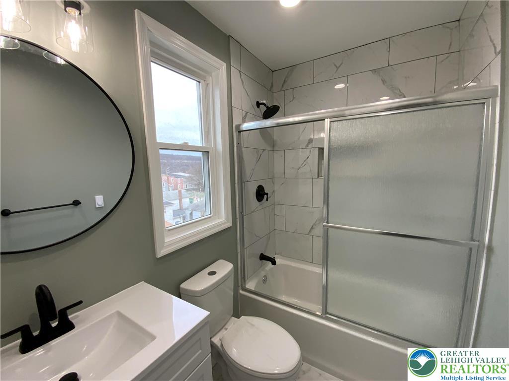 253 East Abbott Street Lansford, PA 18232 - Photo 25 of 43 a bathroom with a sink toilet and shower