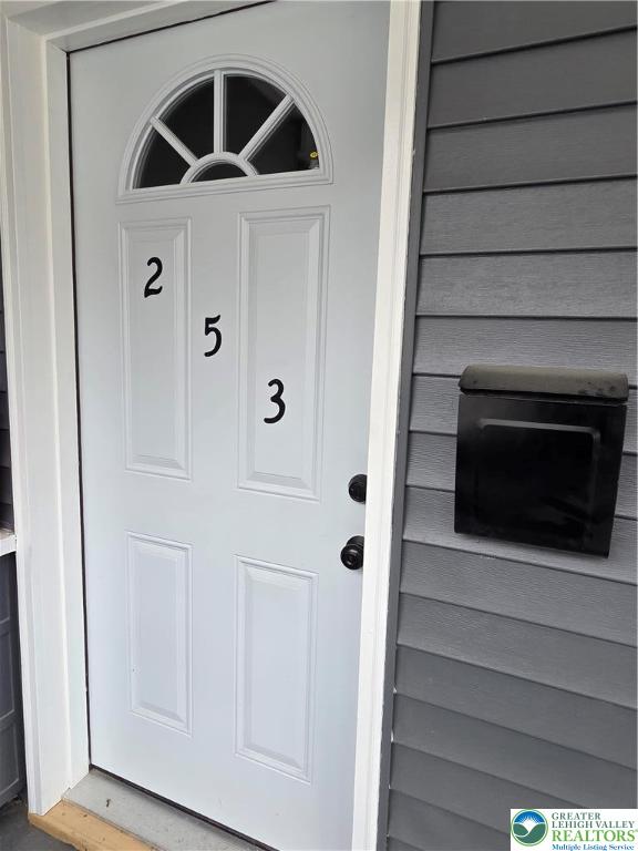 253 East Abbott Street Lansford, PA 18232 - Photo 3 of 43 a bathroom with a shower and a door