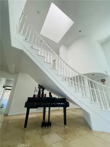 a view of entryway livingroom and hall