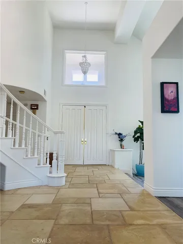 a kitchen with a sink and appliances