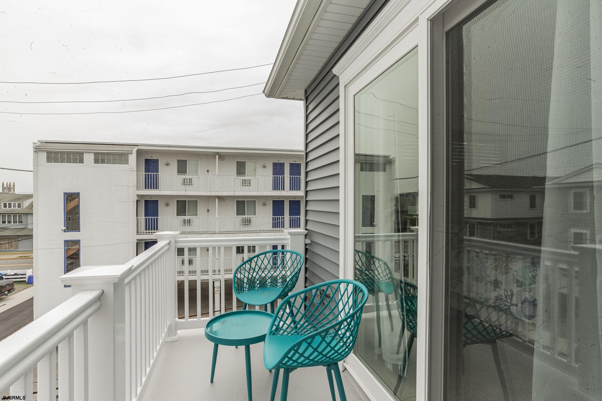 910 Ocean Avenue, Unit C Ocean City, NJ 08226 - Photo 23 of 30 a front view of a house with a porch
