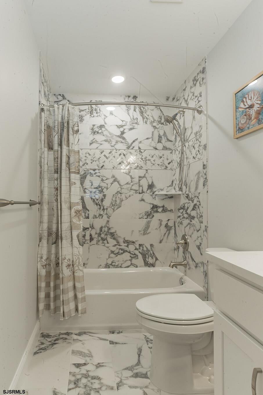 910 Ocean Avenue, Unit C Ocean City, NJ 08226 - Photo 26 of 30 a bathroom with a toilet and shower